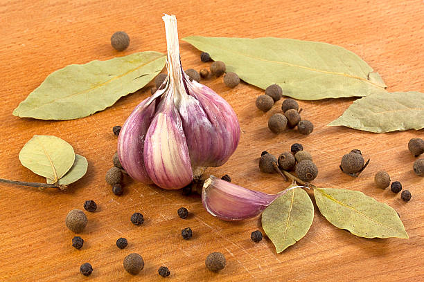 istock garlic with the bay leaf and black pepper 474706819