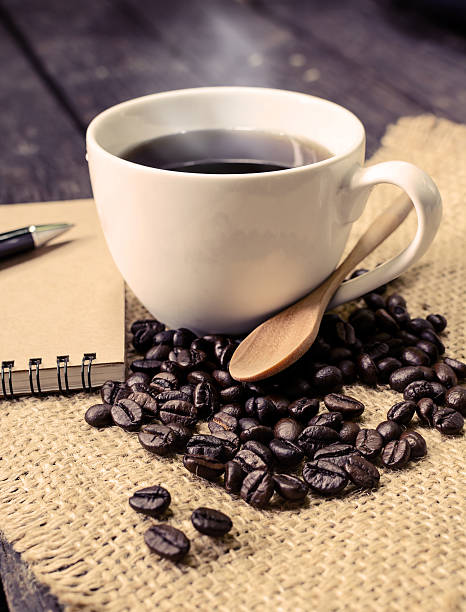 istock Cup of coffee and coffee beans 474711218