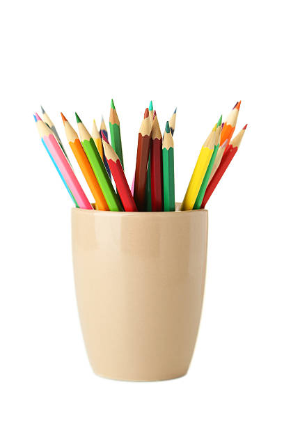istock Colorful pencils in cup isolated on white 474712074