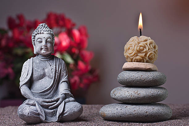 istock stones tower and candle, buddha 474715380