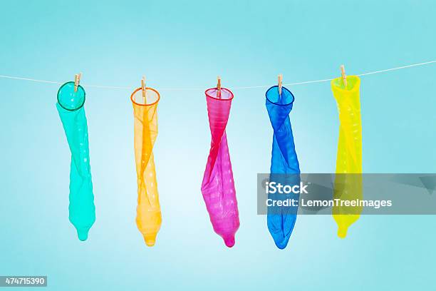 Colorful Condoms Stock Photo - Download Image Now - Condom, Fun, Fluorescent