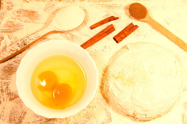 istock homemade baking. dough for pastry, spoon flour on chopping Board 474720408