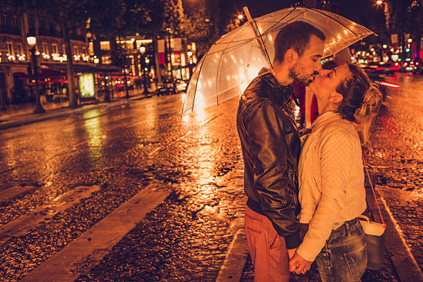 istock Kissing on the rain 474720456