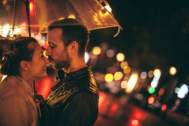 istock Kissing on the rain 474720460