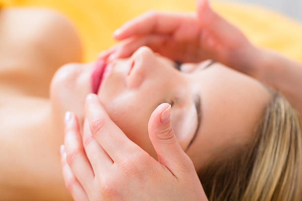 istock Wellness - woman getting head massage in Spa 474720497