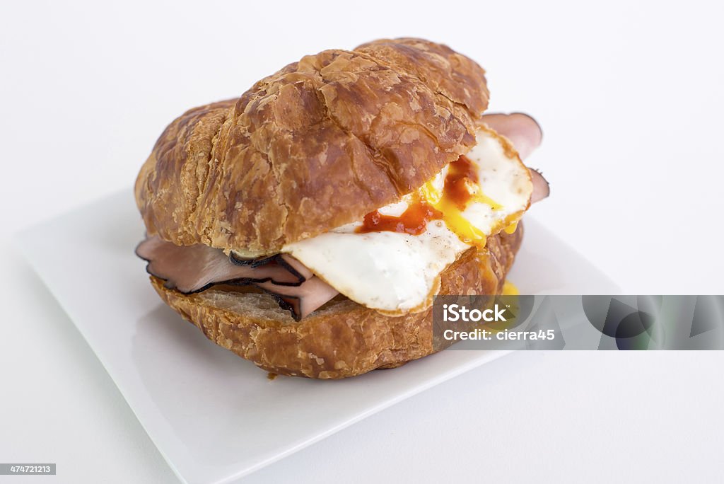 Breakfast Sandwich Black Forest Ham and Sunny Side up egg sandwich. Bread Stock Photo