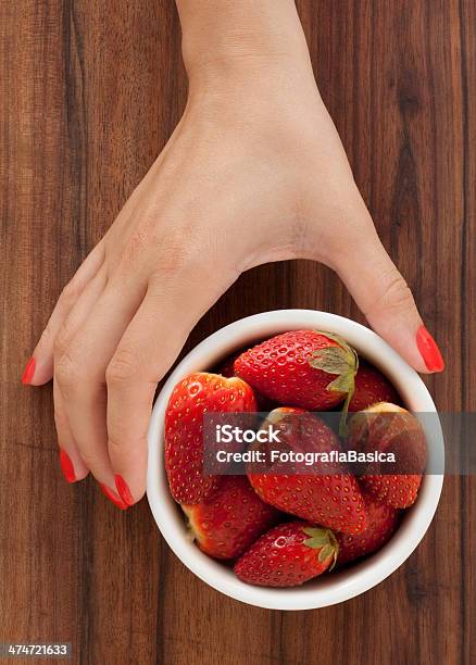 Offering Strawberries Stock Photo - Download Image Now - Adult, Adults Only, Berry Fruit