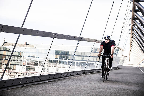 istock Commuter cycling fast at work in the morning 474723672