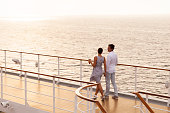 couple walking on cruise ship deck