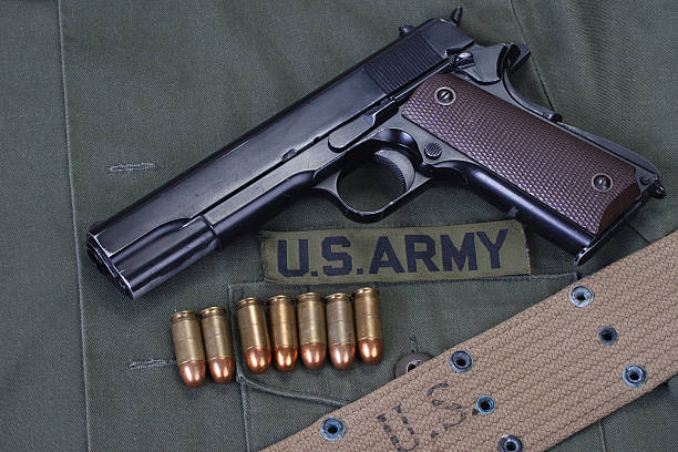 istock colt government 1911 with us army uniform 474725094