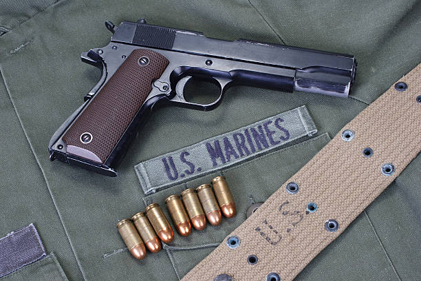istock colt goverment 1911 with us marines uniform 474725814
