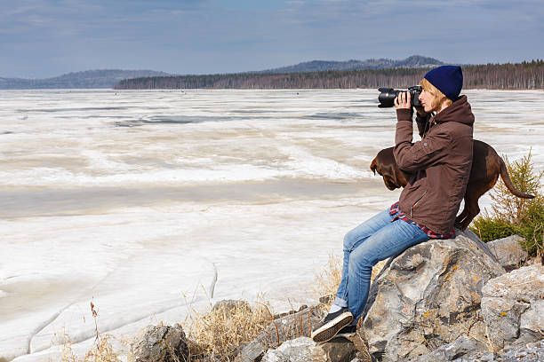 istock Female photographer 474731338