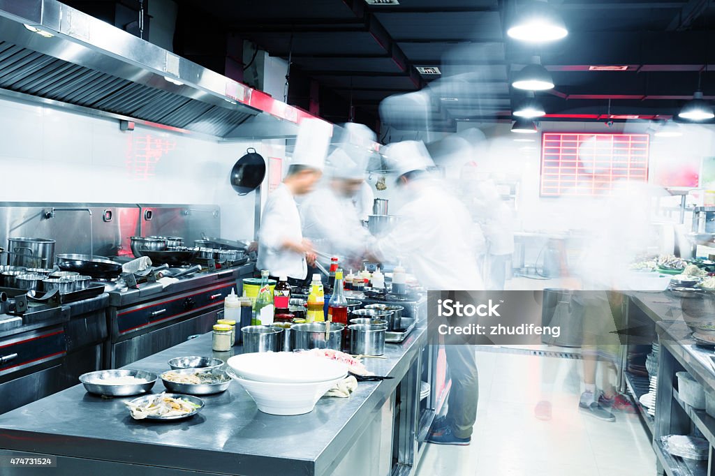 modern kitchen and busy chefs Commercial Kitchen Stock Photo