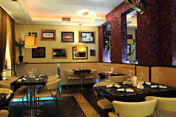 Interior of restaurant with served tables