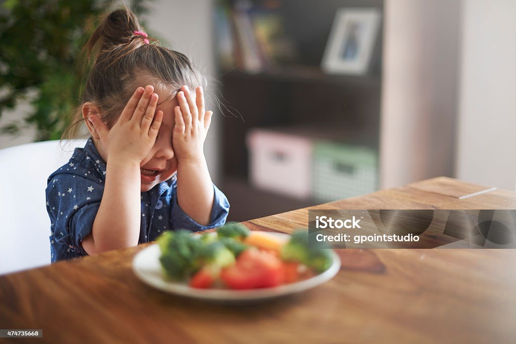 I hate a vegetables! I'm not eating this! Child Stock Photo