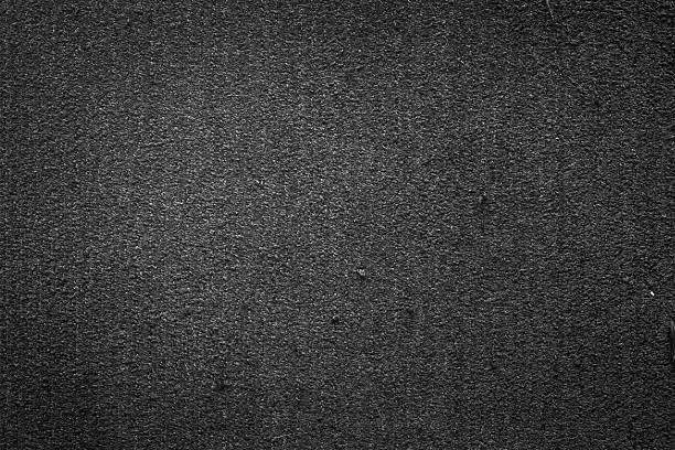 istock Black cloth with no folds texture closeup 474737120