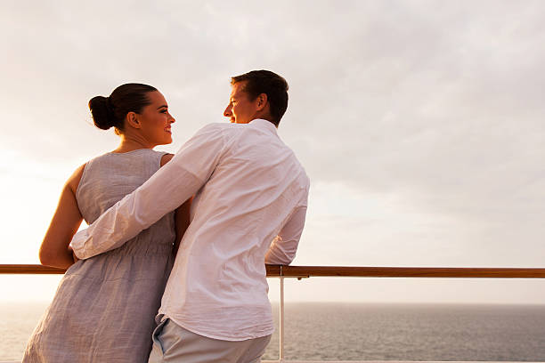 istock young couple looking at each other on cruise 474737154