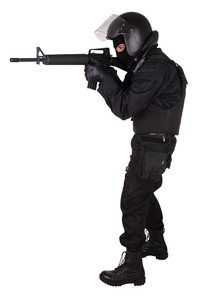 istock Riot police officer in black uniform 474738614