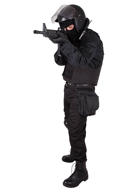 istock Riot police officer in black uniform 474738618