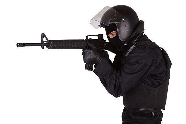 istock Riot police officer in black uniform 474738700