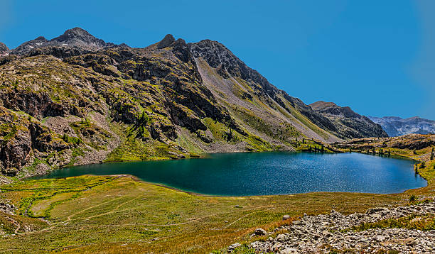 Image of the Big Lake from the Vens Lakes located at 2327 m in Maritime Alps in Mercanotur Park in the south of France. The Vens Lakes are a set of five lakes flowing one in the other