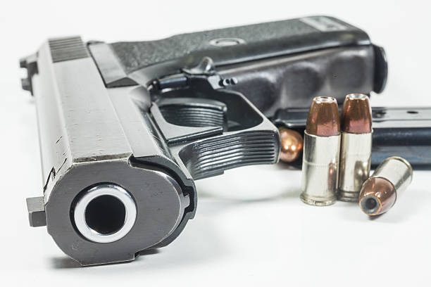 istock 9 mm handgun in a leather holster 474740893