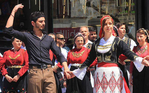 Trikeri, Pelion, Greece, April 13, 2007: Greek women performing a traditional dance in a village square.