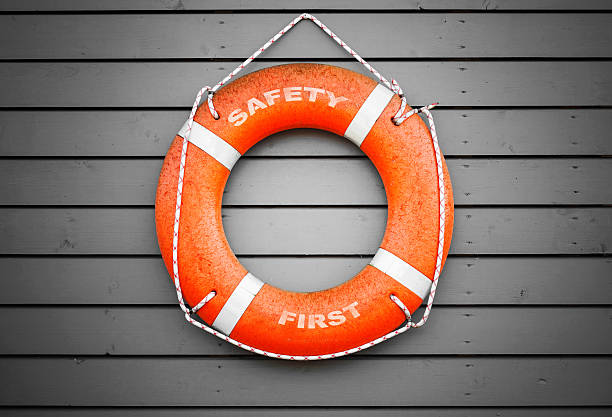 istock Safety first. Red lifebuoy hanging on gray wall 474741718