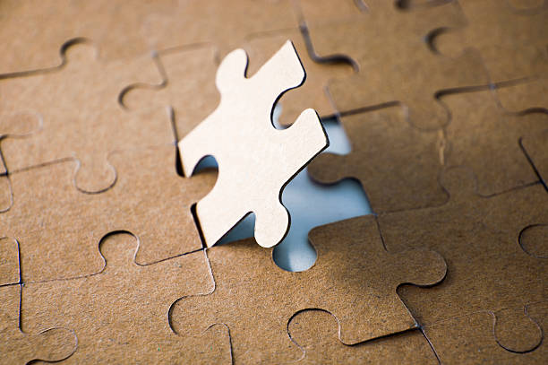 istock Last piece of jigsaw puzzle 474743325