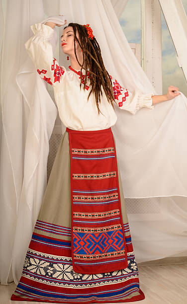 istock young woman in Slavic Belarusian national original suit studio 474746074