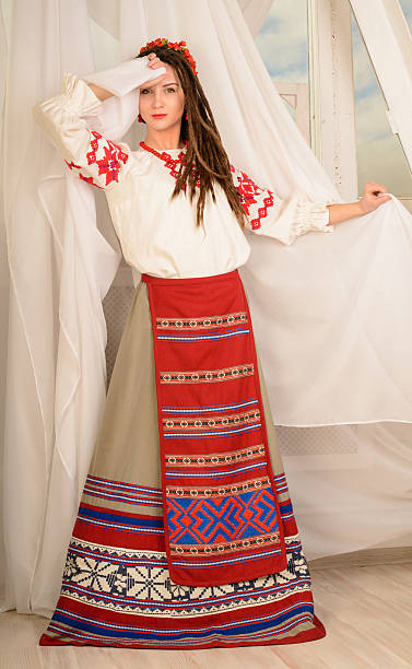 istock young woman in Slavic Belarusian national original suit studio 474746090