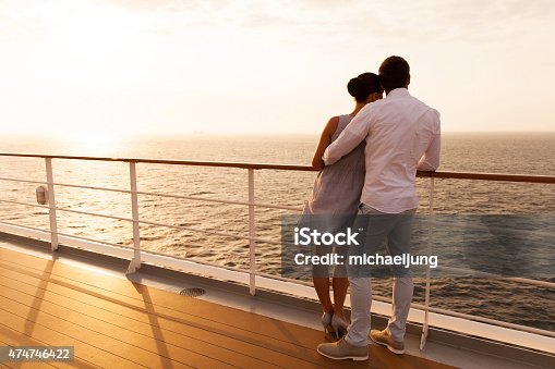 istock young couple hugging at sunset on cruise ship 474746422