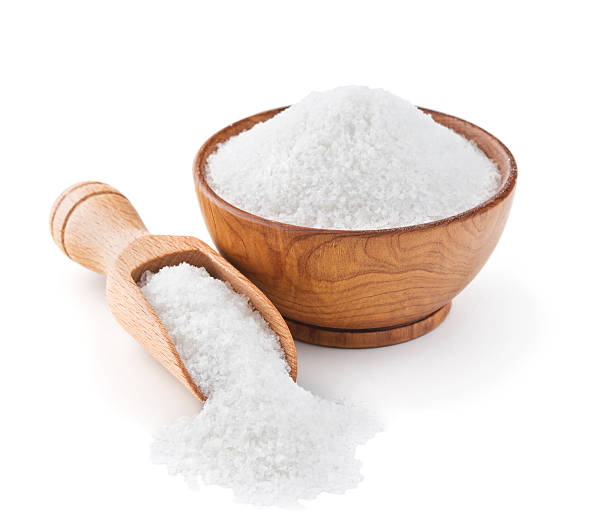 istock Regular table salt in a wooden bowl 474749242