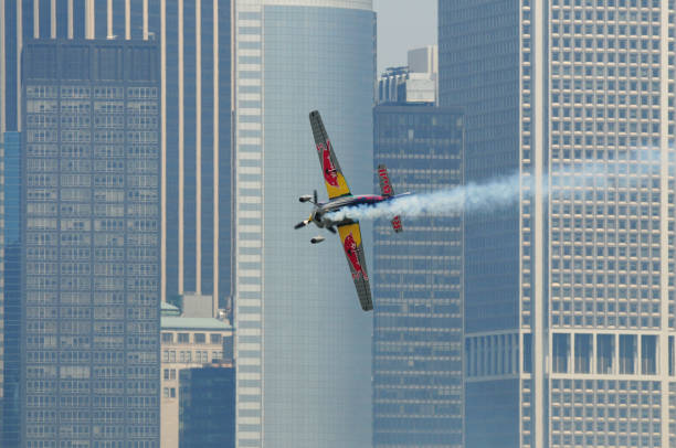 New York City, USA - June 20, 2010: Airplane flying low in New York City, as part of the Red Bull Air-Race worldwide series of competitions. Images were taken during the 2010 season from the NJ city coast side of the Hudson river.