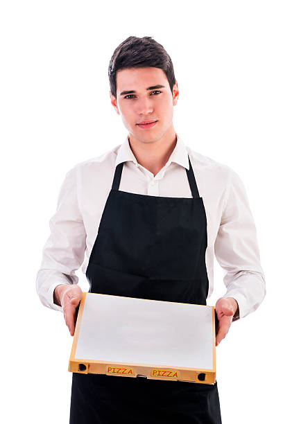 istock Attractive young chef or waiter holding pizza box 474752744