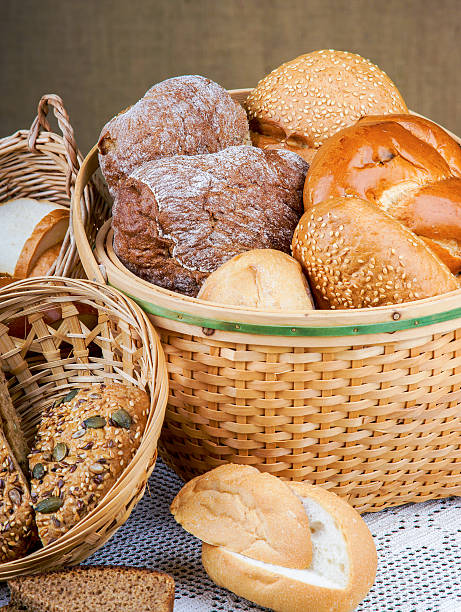 istock Basket of bread on a tablecloth 474753020