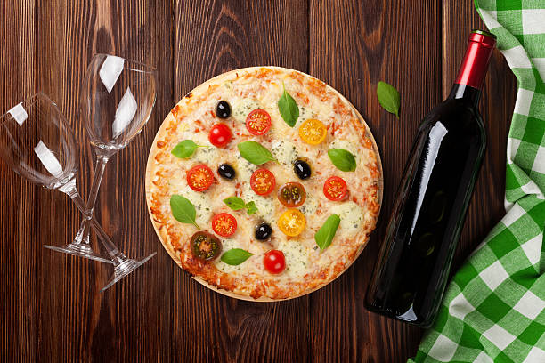 istock Italian pizza and red wine 474753982