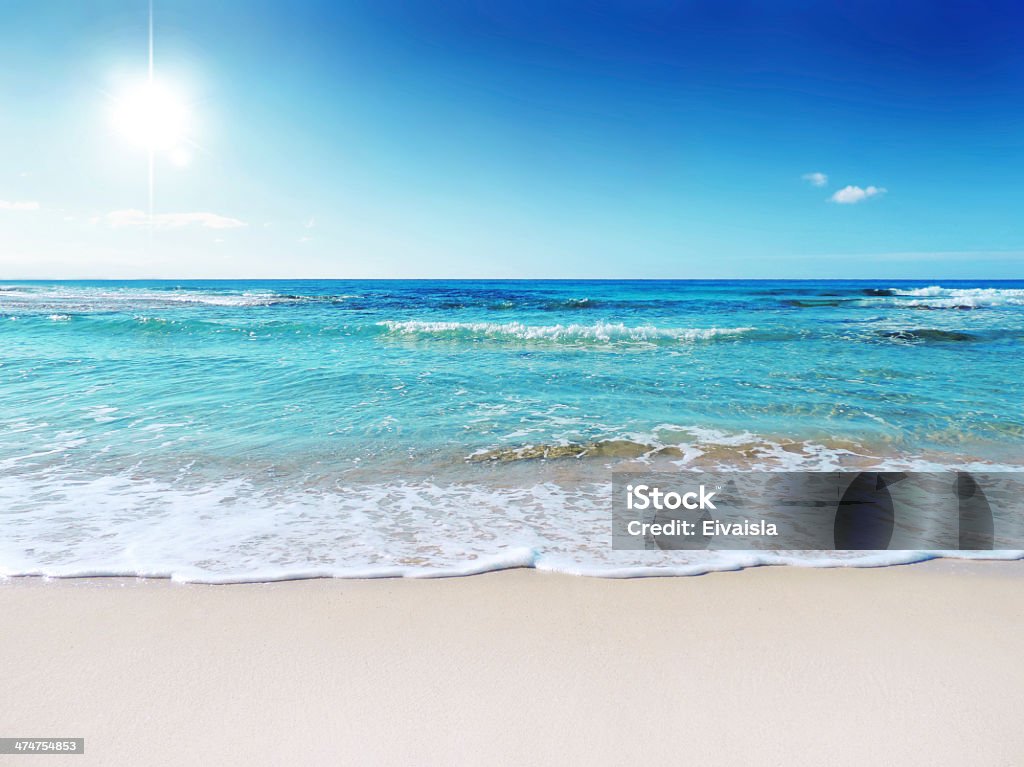 Beach scene showing sand, sea and sky Sun, sea and sand. Beach scene Beach Stock Photo