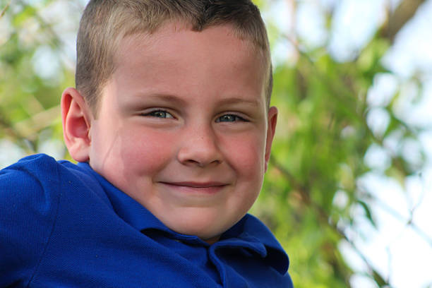 istock Close-up of Boy Posing For Camera 474768342