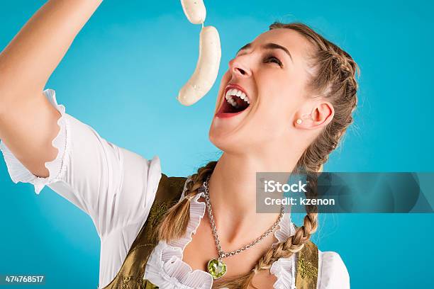 Young Woman In Traditional Clothes Dirndl Or Tracht Stock Photo - Download Image Now