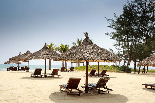 istock Chairs and umbrella on tropical beach 474768968