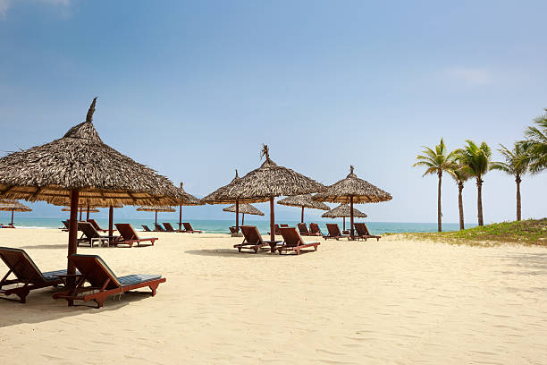 istock Chairs and umbrella on tropical beach 474768972