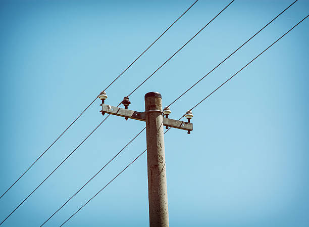 istock Electricity pylon and blue sky 474769266