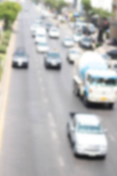 istock blurred of car on road 474771776