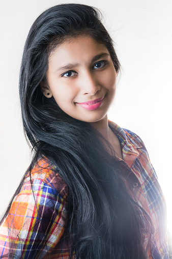 Portrait of a Young Bangladeshi woman on a white background. smooth skin, sharp eye, cute smile