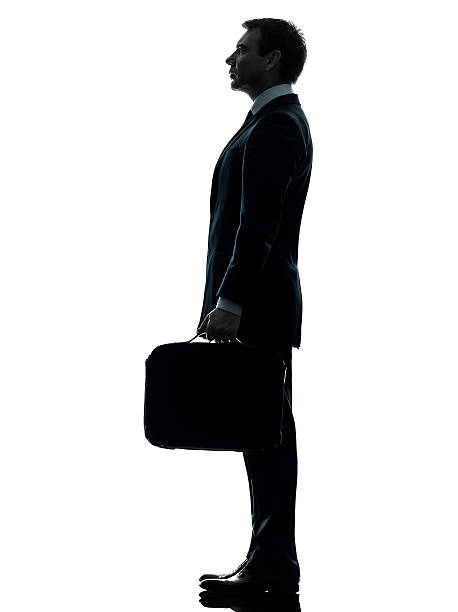 istock business man standing proflie silhouette 474775923