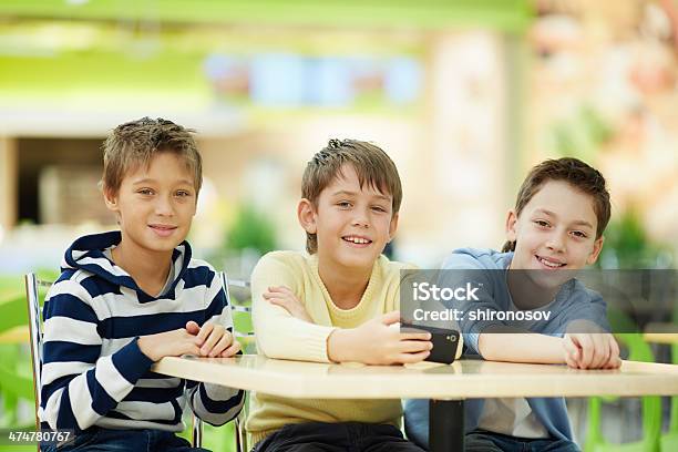 Three Friends Stock Photo - Download Image Now - Boys, Cafe, Carefree