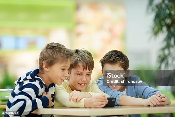 Interesting Video Stock Photo - Download Image Now - Boys, Carefree, Casual Clothing