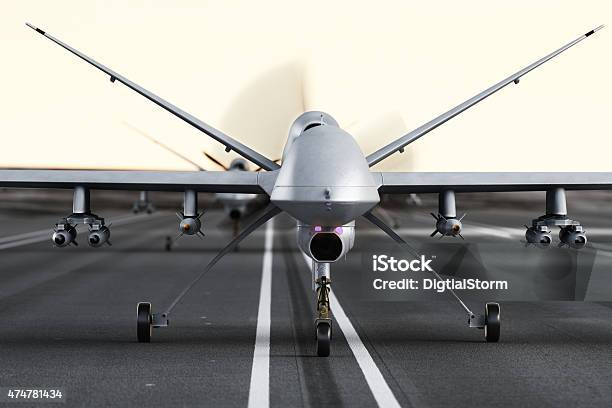 Military Armed Uav Drones Preparing For Takeoff On A Runway Stock Photo - Download Image Now