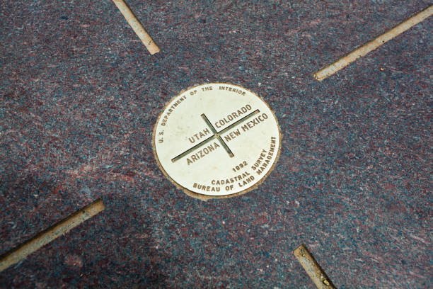Four Corners Monument, Border of the State of Utah, Colorado, New Mexico, and Arizona, USA - May 14, 2015: The Intersection of four states in the southwest of USA. The Four Corners Monument Marking the exact location of the intersection.